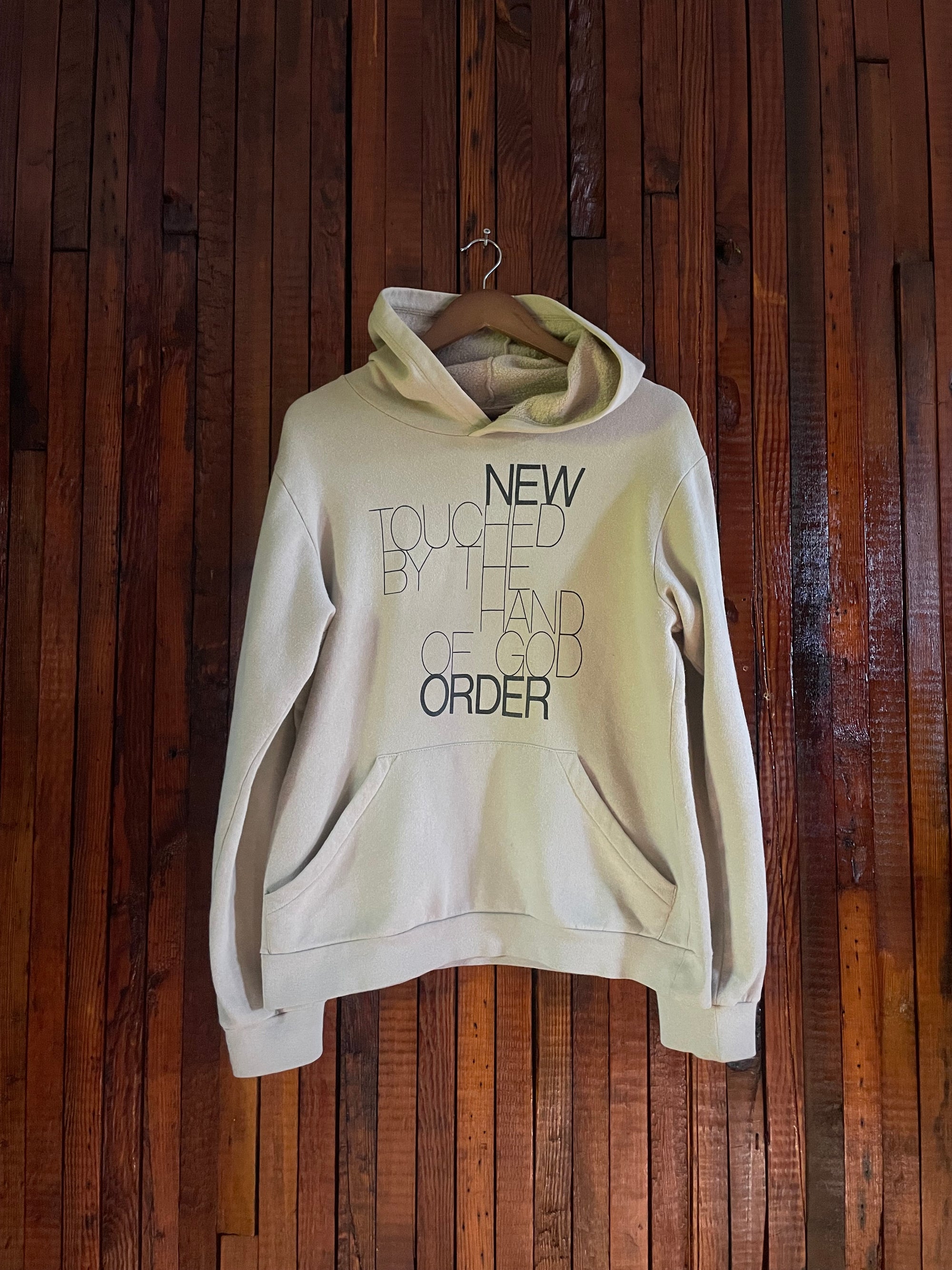 RAF Simon’s “new hand of god”