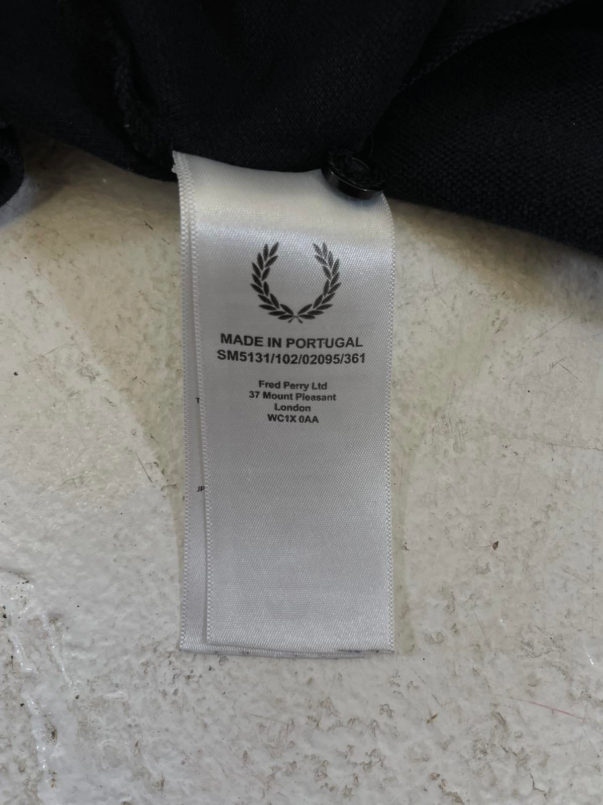 RAF Simon’s Black Polo